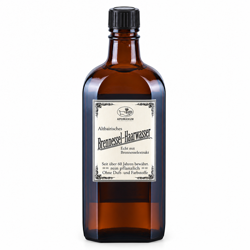 Apomanum Altbairisches Brennnessel-Haarwasser in brauner Glasflasche mit schwarzem Schraubverschluss und historischem Etikett, freigestellt vor weißem Hintergrund.
