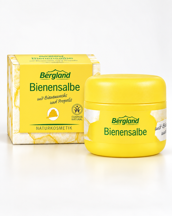 Bergland Bienensalbe 30 ml mit Bienenwachs und Propolis, zusammen mit der gelben Originalverpackung als freigestelltes Produktbild vor hellem Hintergrund.