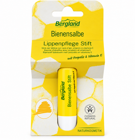 Bergland Bienensalbe Lippenpflege Stift mit Propolis und Vitamin E in gelb-weißer Originalverpackung mit Bienenwabenmotiv und COSMOS NATURAL Siegel, freigestellt vor weißem Hintergrund.