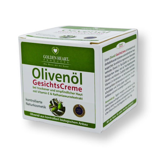 Golden Heart Olivenöl Gesichtscreme 50 ml für trockene und empfindliche Haut mit Vitamin E und Rathaniawurzelextrakt, mit Originalverpackung vor weißem Hintergrund.