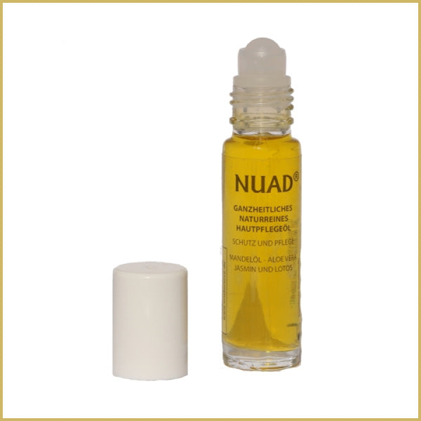 NUAD Öl ganzheitliches naturreines Hautpflegeöl als 10 ml Roll-On mit geöffnetem Verschluss und sichtbarer Rollkugel vor hellem Hintergrund.