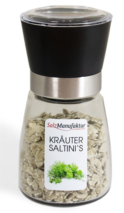 SalzManufaktur Siegsdorf Kräuter Saltini's in einer großen, transparenten Gewürzmühle mit schwarzem Mahlwerk und Edelstahlring.